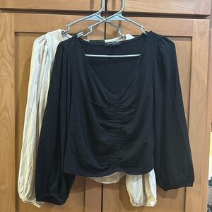 Lot of Two Shirts from Banana Republic.  Size Medium Cream and black shirts.